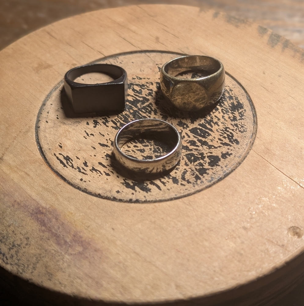 Set Of Three Rings (Gold, Black, And Silver)